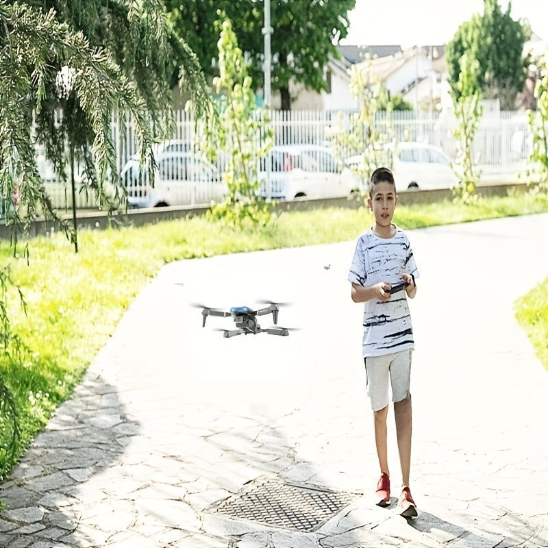 O Drone E99 Possui Duas Câmeras, Suporte Wi-Fi, Controlo por Aplicação e Posicionamento por Fluxo Óptico com Manutenção de Altitude, O que o Torna Perfeito para Iniciantes. Tem Carregamento USB, Opções para Duas ou Três Baterias e é um Quadricóptero Remot