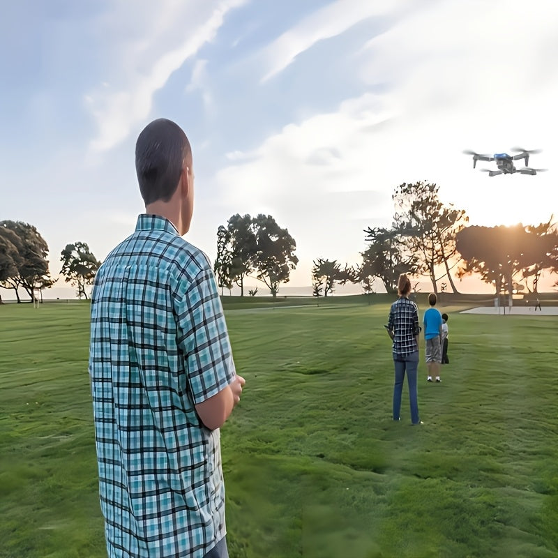 O Drone E99 Possui Duas Câmeras, Suporte Wi-Fi, Controlo por Aplicação e Posicionamento por Fluxo Óptico com Manutenção de Altitude, O que o Torna Perfeito para Iniciantes. Tem Carregamento USB, Opções para Duas ou Três Baterias e é um Quadricóptero Remot